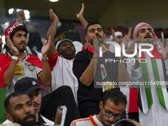 United Arab Emirates team supporters cheer for their team during the qualification 3rd round for the FIFA World Cup 2026 group A match betwe...