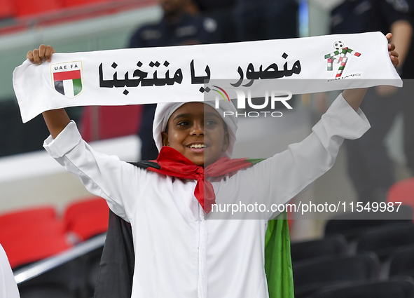 United Arab Emirates team supporters cheer for their team during the qualification 3rd round for the FIFA World Cup 2026 group A match betwe...