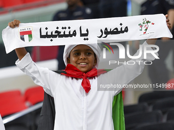 United Arab Emirates team supporters cheer for their team during the qualification 3rd round for the FIFA World Cup 2026 group A match betwe...