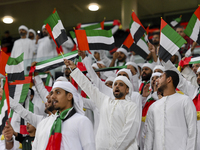 United Arab Emirates team supporters cheer for their team during the qualification 3rd round for the FIFA World Cup 2026 group A match betwe...