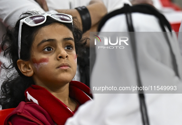 Qatar team supporters cheer for their team during the qualification 3rd round for the FIFA World Cup 2026 group A match between Qatar and Un...