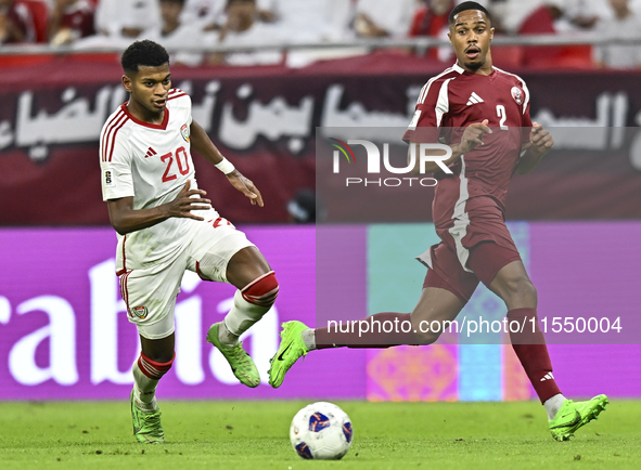 Pedro Correia (R) of Qatar battles for the ball with Yahya Alghassani of the United Arab Emirates during the qualification 3rd round for the...