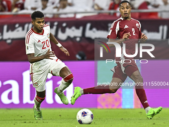 Pedro Correia (R) of Qatar battles for the ball with Yahya Alghassani of the United Arab Emirates during the qualification 3rd round for the...