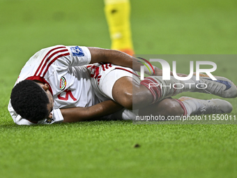 Harib Abdalla of the United Arab Emirates reacts during the qualification 3rd round for the FIFA World Cup 2026 group A match between Qatar...