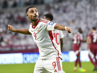 Harib Abdalla of the United Arab Emirates celebrates after scoring during the qualification 3rd round for the FIFA World Cup 2026 group A ma...