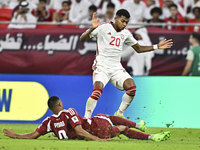 Pedro Correia of Qatar battles for the ball with Yahya Alghassani of the United Arab Emirates during the qualification 3rd round for the FIF...