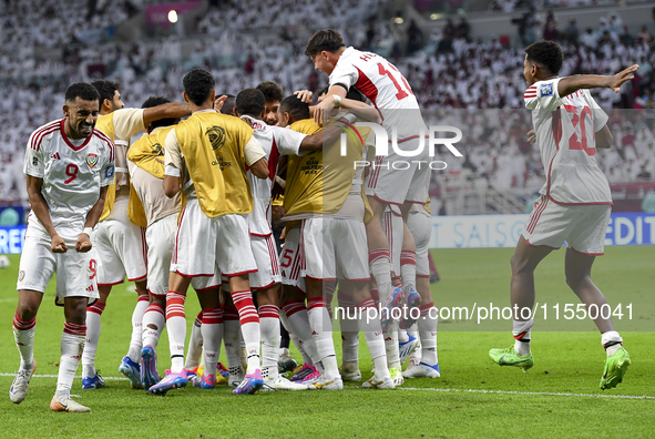 Players of the United Arab Emirates celebrate after scoring a goal during the qualification 3rd round for the FIFA World Cup 2026 group A ma...