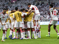 Players of the United Arab Emirates celebrate after scoring a goal during the qualification 3rd round for the FIFA World Cup 2026 group A ma...