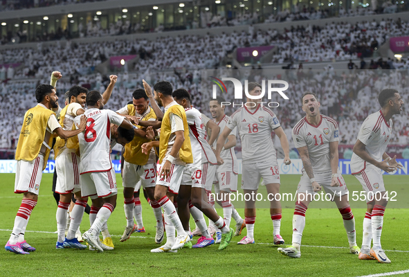 Players of the United Arab Emirates celebrate after scoring a goal during the qualification 3rd round for the FIFA World Cup 2026 group A ma...