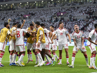 Players of the United Arab Emirates celebrate after scoring a goal during the qualification 3rd round for the FIFA World Cup 2026 group A ma...