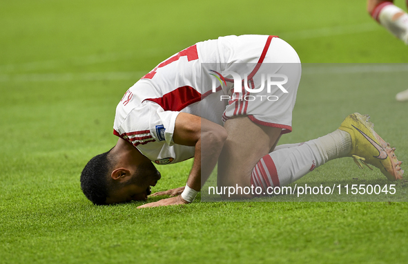 Khaled Aldhanhani (#19) of the United Arab Emirates celebrates after scoring a goal during the qualification 3rd round for the FIFA World Cu...