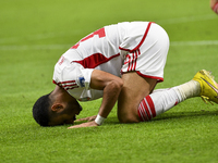 Khaled Aldhanhani (#19) of the United Arab Emirates celebrates after scoring a goal during the qualification 3rd round for the FIFA World Cu...