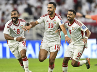 Khaled Aldhanhani (#19) of the United Arab Emirates celebrates after scoring a goal during the qualification 3rd round for the FIFA World Cu...