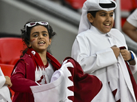 Qatar team supporters cheer for their team during the qualification 3rd round for the FIFA World Cup 2026 group A match between Qatar and Un...