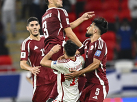 Lucas Mendes of Qatar battles for the ball with Caio Correa of the United Arab Emirates during the qualification 3rd round for the FIFA Worl...