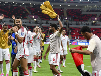 Players from the United Arab Emirates celebrate their victory in the qualification 3rd round for the FIFA World Cup 2026 group A match betwe...