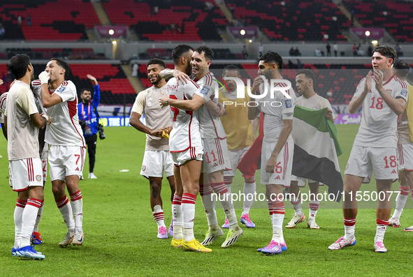 Players from the United Arab Emirates celebrate their victory in the qualification 3rd round for the FIFA World Cup 2026 group A match betwe...