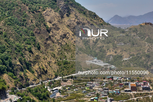 Buildings stand along the mountainside in Mussoorie, Uttarakhand, India, on April 18, 2024. 