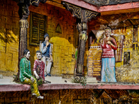 An artistic display depicts Kumaon villagers in a traditional home along the Mall Road in Mussoorie, Uttarakhand, India, on April 18, 2024....