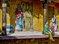 An artistic display depicts Kumaon villagers in a traditional home along the Mall Road in Mussoorie, Uttarakhand, India, on April 18, 2024....