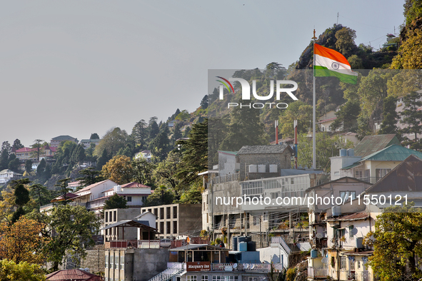 The Indian flag flutters in Mussoorie, Uttarakhand, India, on April 18, 2024. 