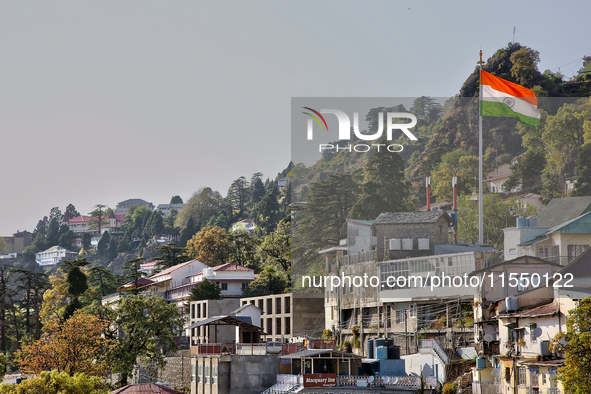 The Indian flag flutters in Mussoorie, Uttarakhand, India, on April 18, 2024. 