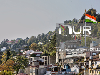 The Indian flag flutters in Mussoorie, Uttarakhand, India, on April 18, 2024. (