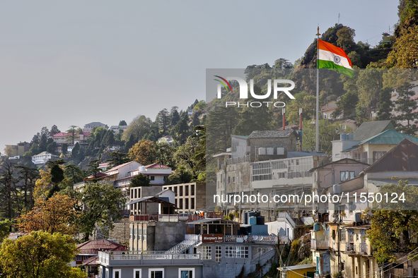 The Indian flag flutters in Mussoorie, Uttarakhand, India, on April 18, 2024. 