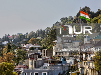 The Indian flag flutters in Mussoorie, Uttarakhand, India, on April 18, 2024. (