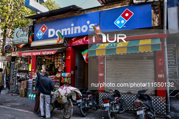 Dominos Pizza restaurant along the Mall Road in Mussoorie, Uttarakhand, India, on April 18, 2024. 