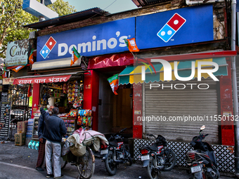 Dominos Pizza restaurant along the Mall Road in Mussoorie, Uttarakhand, India, on April 18, 2024. (