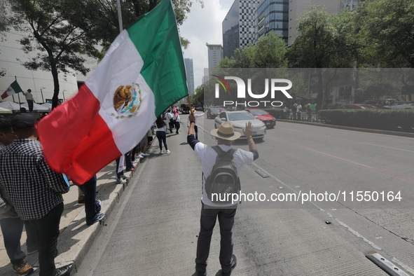 Judiciary workers block the streets near the Senate of Mexico, blocking access to legislators, while demonstrating to protest against the Ju...