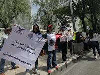 Judiciary workers block the streets near the Senate of Mexico, blocking access to legislators, while demonstrating to protest against the Ju...