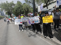 Judiciary workers block the streets near the Senate of Mexico, blocking access to legislators, while demonstrating to protest against the Ju...