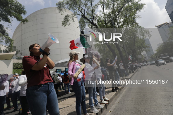 Judiciary workers block the streets near the Senate of Mexico, blocking access to legislators, while demonstrating to protest against the Ju...