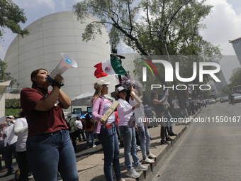 Judiciary workers block the streets near the Senate of Mexico, blocking access to legislators, while demonstrating to protest against the Ju...