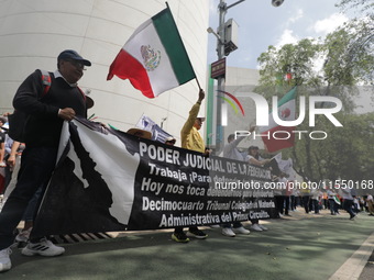 Judiciary workers block the streets near the Senate of Mexico, blocking access to legislators, while demonstrating to protest against the Ju...