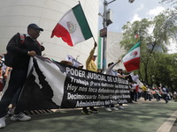 Judiciary workers block the streets near the Senate of Mexico, blocking access to legislators, while demonstrating to protest against the Ju...