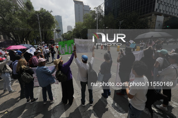 Judiciary workers block the streets near the Senate of Mexico, blocking access to legislators, while demonstrating to protest against the Ju...