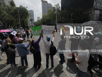 Judiciary workers block the streets near the Senate of Mexico, blocking access to legislators, while demonstrating to protest against the Ju...