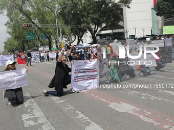 Judiciary workers block the streets near the Senate of Mexico, blocking access to legislators, while demonstrating to protest against the Ju...