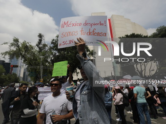 Judiciary workers block the streets near the Senate of Mexico, blocking access to legislators, while demonstrating to protest against the Ju...