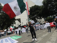 Judiciary workers block the streets near the Senate of Mexico, blocking access to legislators, while demonstrating to protest against the Ju...