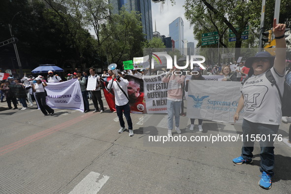 Judiciary workers block the streets near the Senate of Mexico, blocking access to legislators, while demonstrating to protest against the Ju...