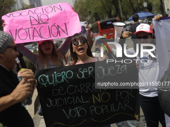 Judiciary workers block the streets near the Senate of Mexico, blocking access to legislators, while demonstrating to protest against the Ju...