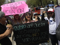 Judiciary workers block the streets near the Senate of Mexico, blocking access to legislators, while demonstrating to protest against the Ju...