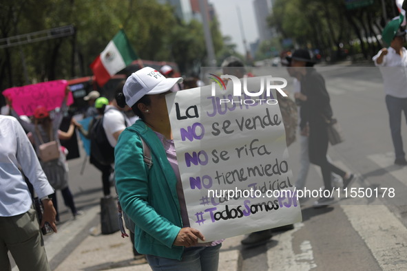 Judiciary workers block the streets near the Senate of Mexico, blocking access to legislators, while demonstrating to protest against the Ju...