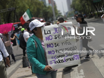 Judiciary workers block the streets near the Senate of Mexico, blocking access to legislators, while demonstrating to protest against the Ju...