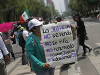 Judiciary workers block the streets near the Senate of Mexico, blocking access to legislators, while demonstrating to protest against the Ju...