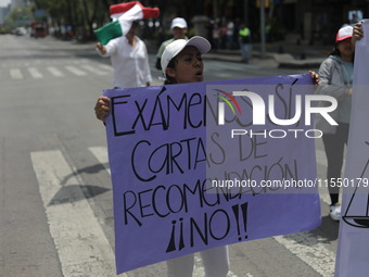 Judiciary workers block the streets near the Senate of Mexico, blocking access to legislators, while demonstrating to protest against the Ju...